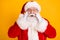 Portrait of astonished santa claus impressed incredible magic miracle x-mas discounts touch gloves hands face wear red