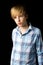 Portrait of attractive blond teenage boy. Studio portrait.