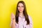 Portrait of attractive brainy cheerful girl lecturer explaining subject isolated over bright yellow color background