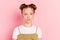 Portrait of attractive calm content funky pre-teen girl foxy ginger hair isolated over pink pastel color background