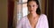 Portrait of attractive Caucasian woman inside a hotel room