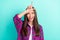 Portrait of attractive cheerful girl showing horn sign bullying isolated over bright teal green color background