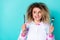 Portrait of attractive cheerful hungry wavy-haired girl holding fork nutrition concept isolated over bright teal