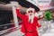 Portrait of attractive cheerful Santa rejoicing having fun festal day christmastime luck at shopping mall indoors