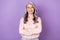 Portrait of attractive clever cheerful content woman expert folded arms isolated over violet purple color background