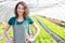 Portrait of an attractive farmer in a greenhouse