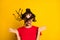 Portrait of attractive funny cheeeful careless girl throwing hair having fun isolated on bright yellow color background