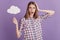 Portrait of attractive lovely lady amazed shocked fake news hold clouds bubble isolated on violet color background