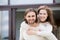 Portrait of attractive smiling married couple outdoors