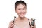 Portrait of attractive young asian woman holding make-up brushs