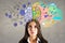 Portrait of attractive young european businesswoman with creative colorful brain sketch on wall background. Brainstorm and