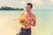 Portrait of an attractive young man on a tropical beach