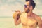 Portrait of an attractive young man on a tropical beach