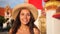 Portrait of Attractive Young Mixed Race Tourist Girl in Straw Hat with Traditional Thai Buddhist Temple on Background