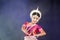 Portrait of authentic Odissi Dancer performing Odissi Dance on stage at Konark Temple, Odisha, India.