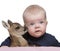 Portrait of baby boy with Fallow Deer Fawn