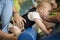 Portrait of a baby with cerebral palsy on physiotherapy in a children therapy center. Boy with disability has therapy by doing