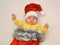 Portrait of the baby in a New Year\'s suit Santa Claus on a light background a light