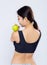 Portrait back asian woman smiling holding green apple fruit and beautiful body diet with fit isolated
