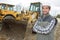 Portrait backhoe operator posing