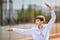 Portrait ballet boy exercise against the background of city reflection in glass wall