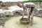 Portrait of Bangladeshi boy working in gravel pit
