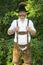 Portrait of bavarian man in lederhosen