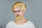 Portrait of bearded man with color hair. Hair coloring. Bearded blonde man with long beard and moustache.