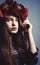 portrait of a beatiful girl with a wreath in studio