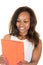 Portrait of beautiful African American woman joyful reading something on electronic tablet in white studio background