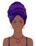 Portrait of beautiful African woman in turban. Tribal style fashion.