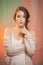 Portrait of beautiful angelic look young woman in studio