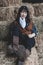 Portrait of a beautiful armed Chinese female cowgirl