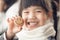 Portrait of beautiful asia Children feel happy eating Bread smiley face