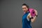 Portrait beautiful Asian woman sweating in sportswear after cardio exercise and standing on banner grey background