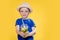 Portrait of a beautiful boy. Happy child. European boy in a hat, summer t-shirt with lemonade. Summer, vacation