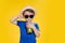 Portrait of a beautiful boy. Happy child. European boy in a hat, summer t-shirt with lemonade. Summer, vacation, vacation, sun,