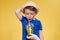 Portrait of a beautiful boy. Happy child. European boy in a hat, summer t-shirt with lemonade. Summer, vacation, vacation, sun,