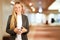 Portrait of beautiful business woman standing in office