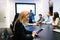 Portrait of beautiful businesswoman in conference room