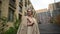 Portrait of a beautiful Caucasian elderly grey-haired woman outdoors. 360 degree video.
