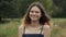 Portrait of beautiful cheerful smiling laughing teenager girl 15 years old, with brown flying hair looking at camera