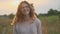 Portrait of beautiful cheerful smiling laughing teenager girl 15 years old, with brown flying hair looking at camera