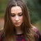 Portrait of a Beautiful Dark Blond Teenage Girl in a Forest