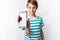 Portrait of a beautiful and emotional boy, in whose hands a broken phone shows surprise, white background, blue t-shirt, advertisi