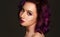 Portrait of beautiful fashion model with purple hair over g