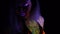Portrait of beautiful fashion woman in neon uv light. Model girl with fluorescent creative psychedelic makeup, art