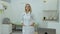 Portrait of beautiful female caucasian professional medical doctor standing in his health clinic office. Medicine