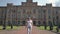 Portrait beautiful girl against backdrop facade beautiful architectural building