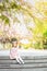 Portrait of beautiful girl with blooming flowers. Cherry blossom. Little caucasian girl with long blonde hair standing in the park